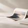 Fine-art inkjet paper rolls and archival print in a warm studio